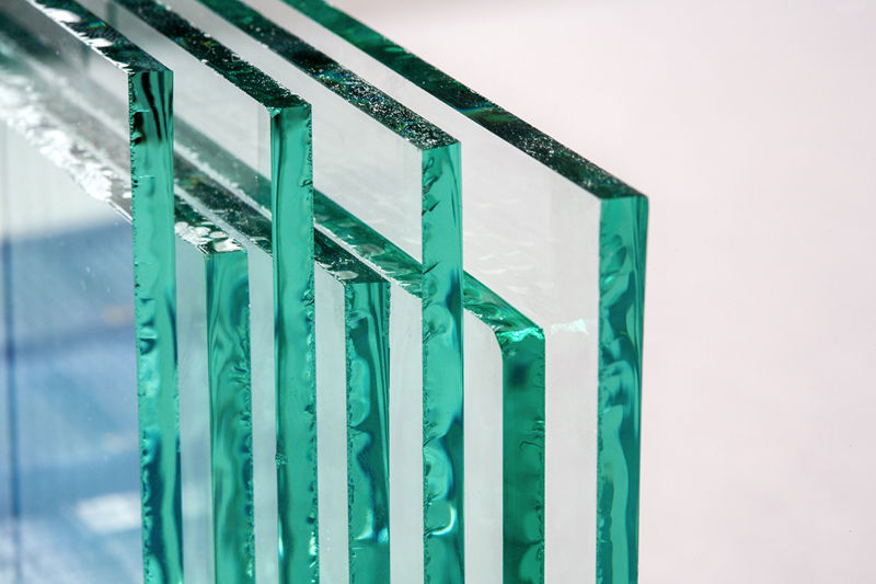 Photograph showing sheets of factory-made tempered clear float glass panels.