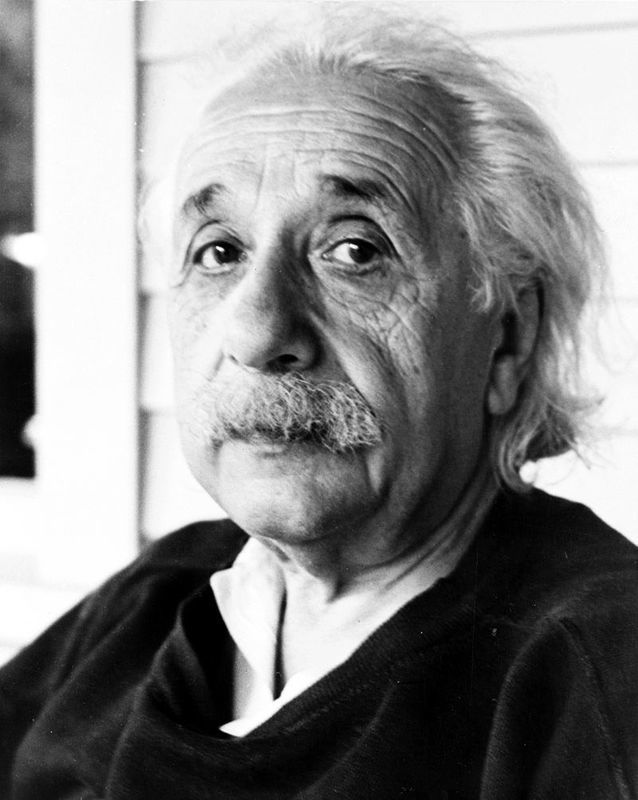 Black-and-white photograph of an old man with white hair and moustache (Albert Einstein).